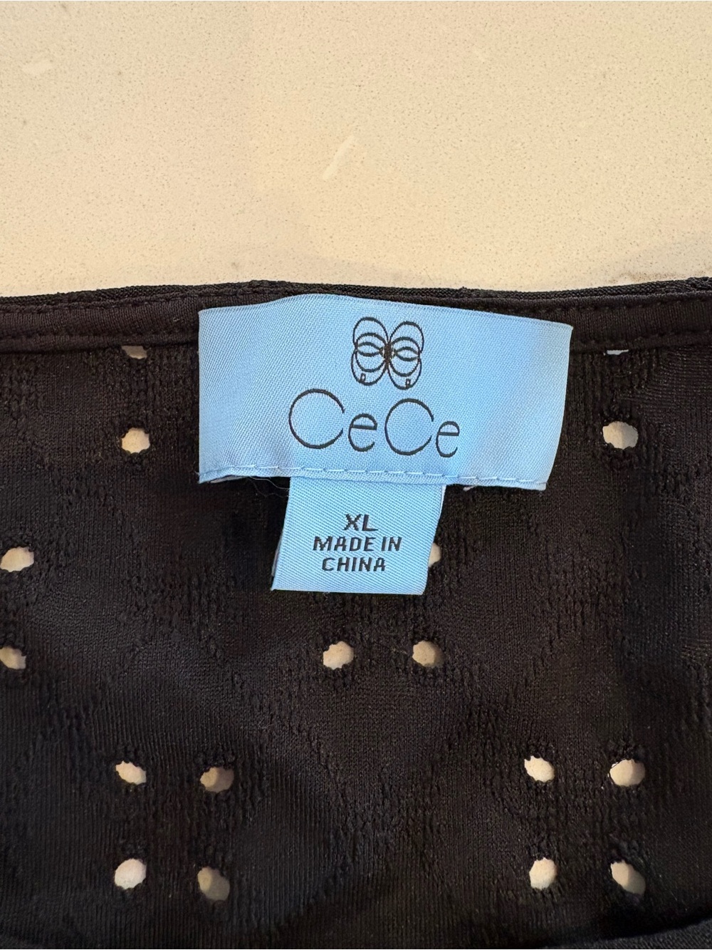 CeCe Black Eyelet Blouse with Light Blue Label